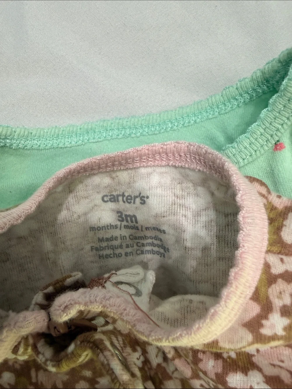 Assorted footed onesies